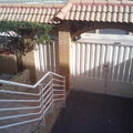 Arcos y tejadillo en fachada