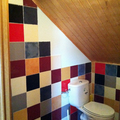 baño abuhardillado