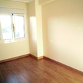Pavimento flotante  roble en dormitorio.