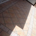 Terminacion de alfombra con gres..
