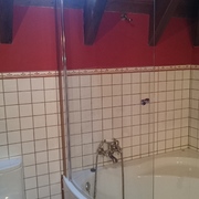 Instalación mampara especial bañeras curvas