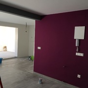 Salón con cocina americana acabado