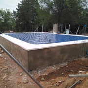 CONSTRUCCIÓN DE PISCINA