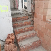 Stairs from kitchen extension to utility room