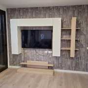 Anclaje pared de mueble y tv.