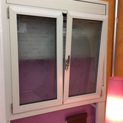 Practicable oscilobatiente doble hoja monobloc