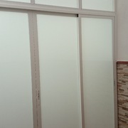 Puerta corredera de 4 hojas centro tope