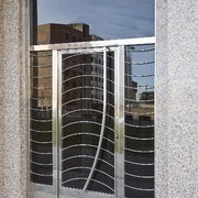 Puerta principal en acero inoxidable