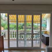 VENTANA PVC CON BARROTILLO INTERIOR