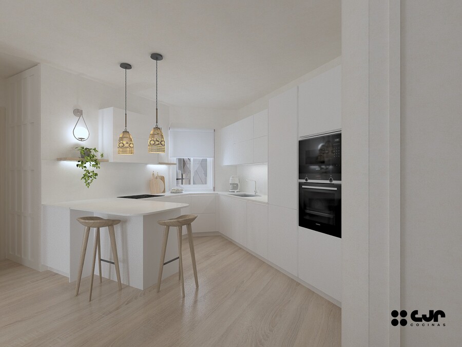 Cocina abierta con barra y luminarias decorativas