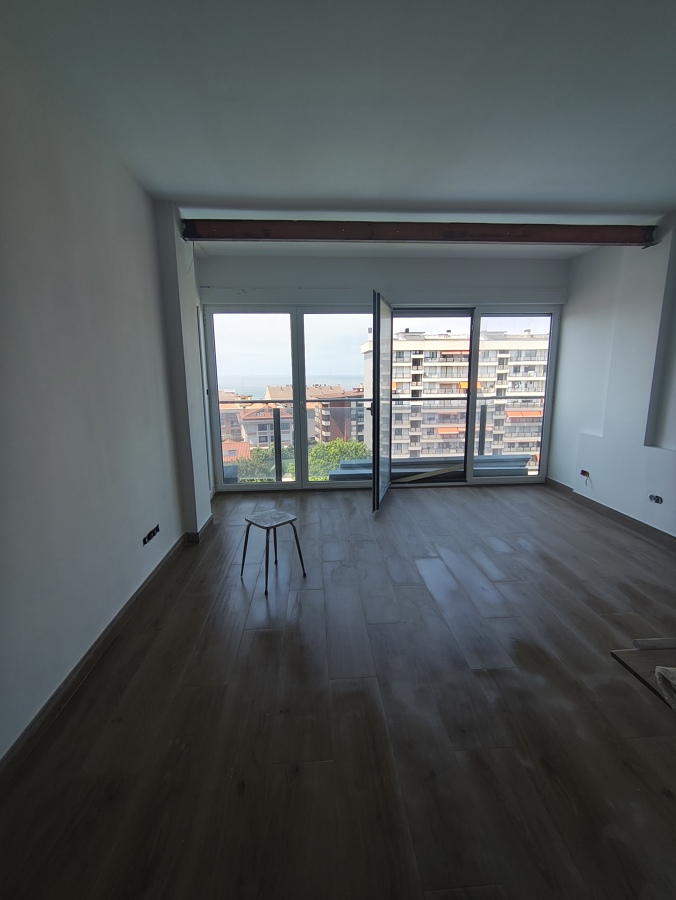 Sala con vista al mar
