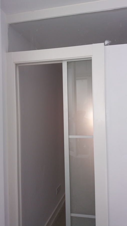 Puerta corredera acristalada