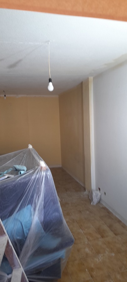 Proceso de Alisado de gotelé en salon
