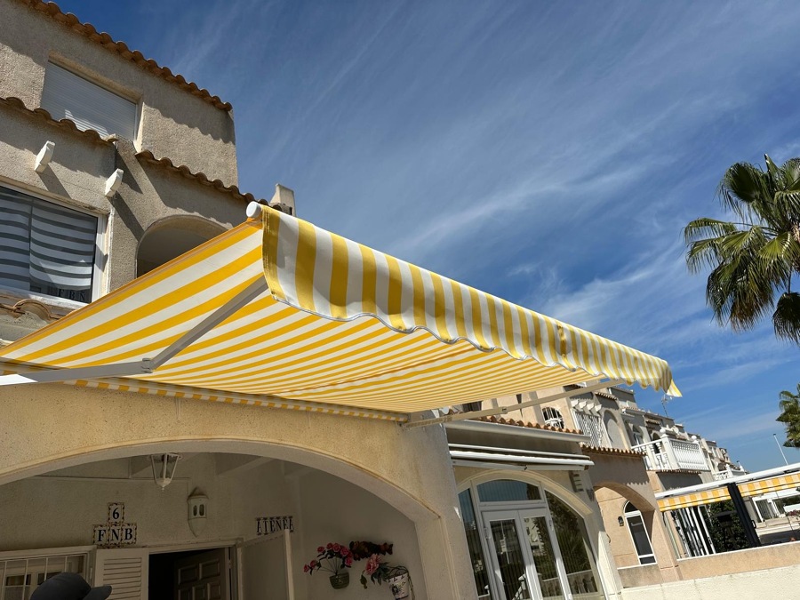 Toldo brazo extensible