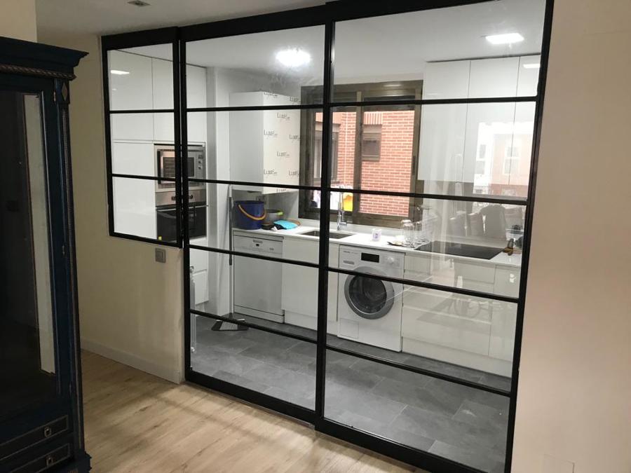 Puerta corredera en forja