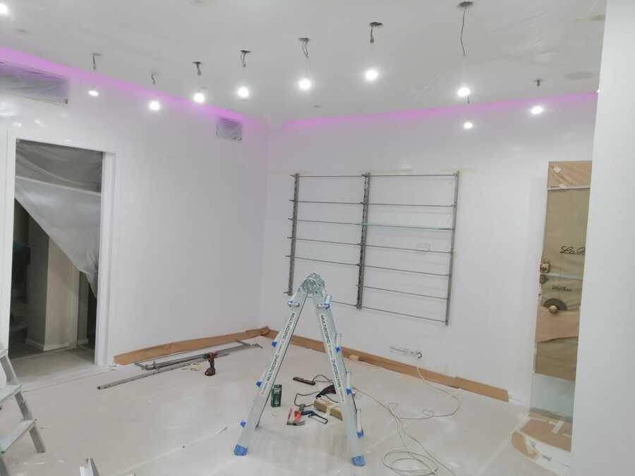Calidad y delicadeza, pintura y decoración farmacia