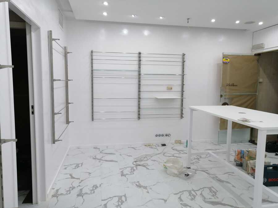 Calidad y delicadeza, pintura y decoración farmacia