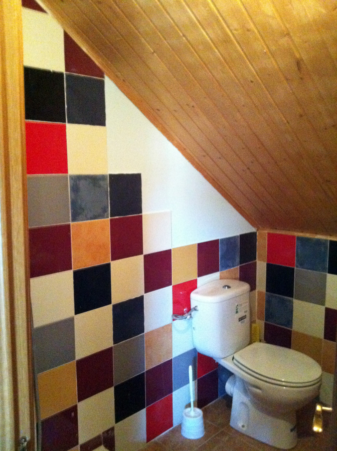baño abuhardillado
