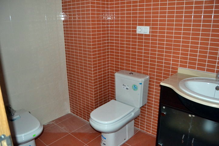 Foto: Baño-naranja de Constructora Broch-3,S.L. #222512 - Habitissimo