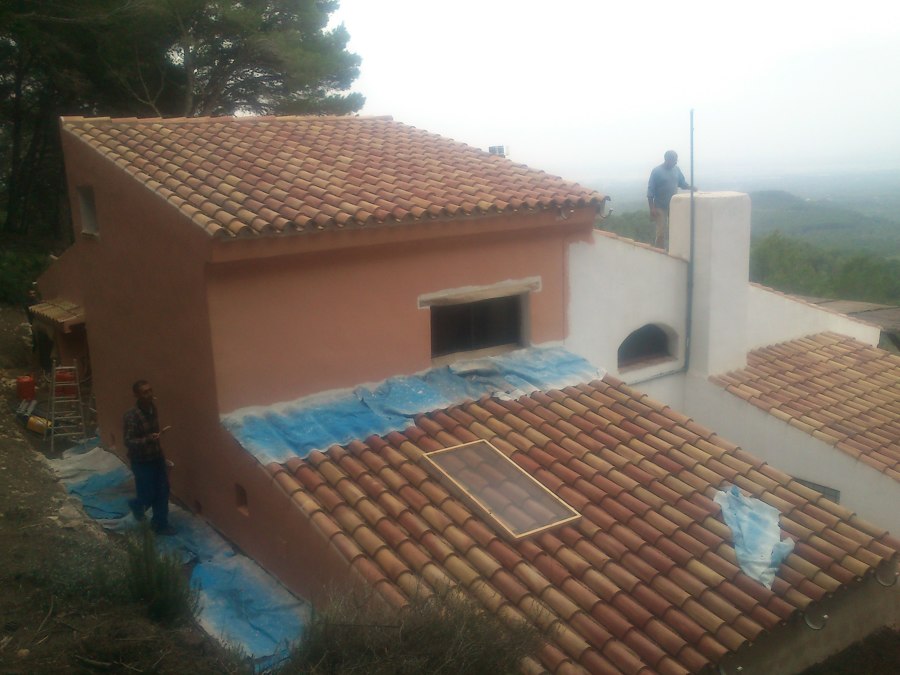 Pintura en fachada casa rustica