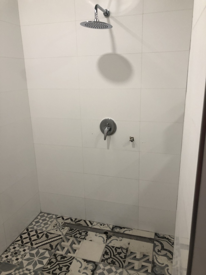 Ducha de obra