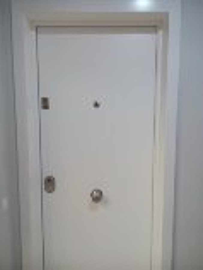 Puerta conjunto MCM