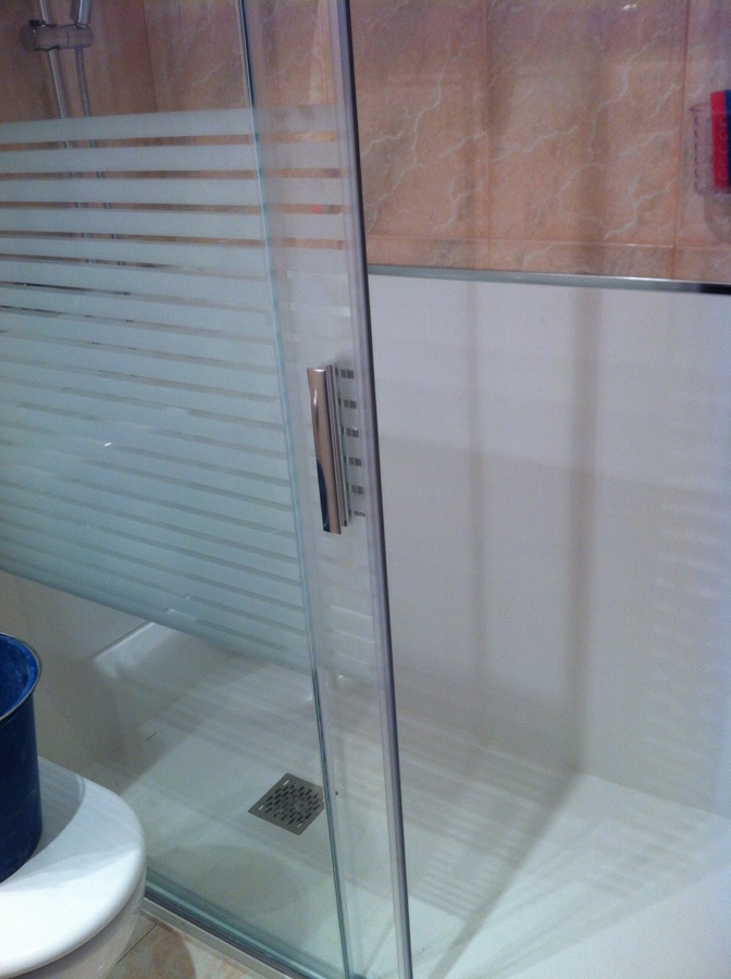 Reforma de baño y colocación de mampara