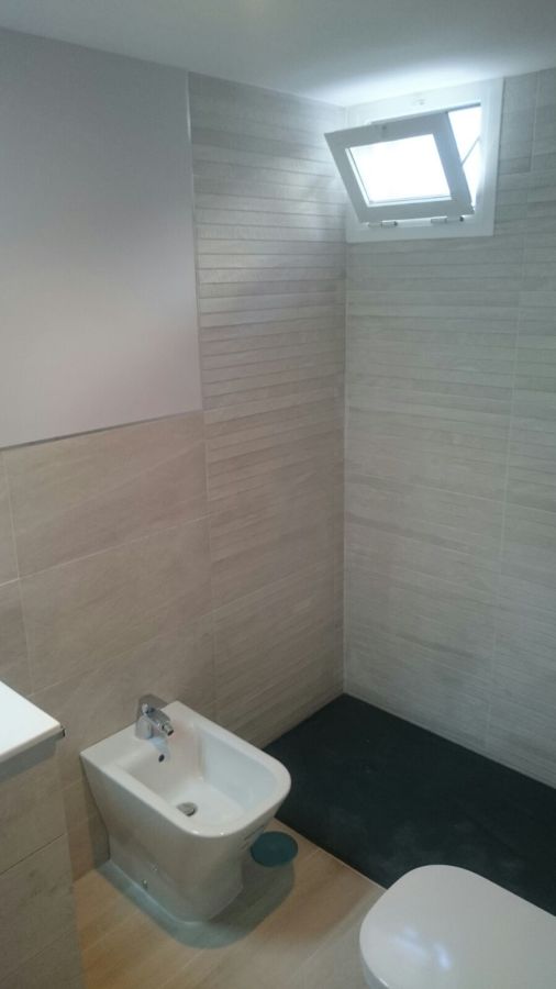 Alicatado en baño