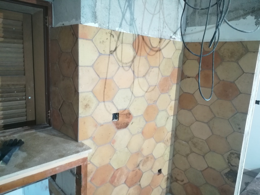 Baldosa de barro hexagonal