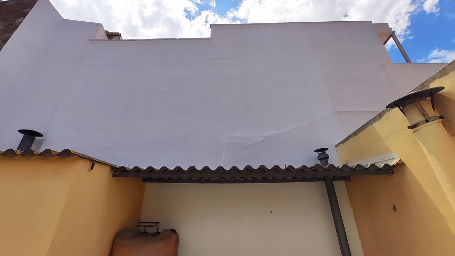 Reparación de medianera por filtraciones