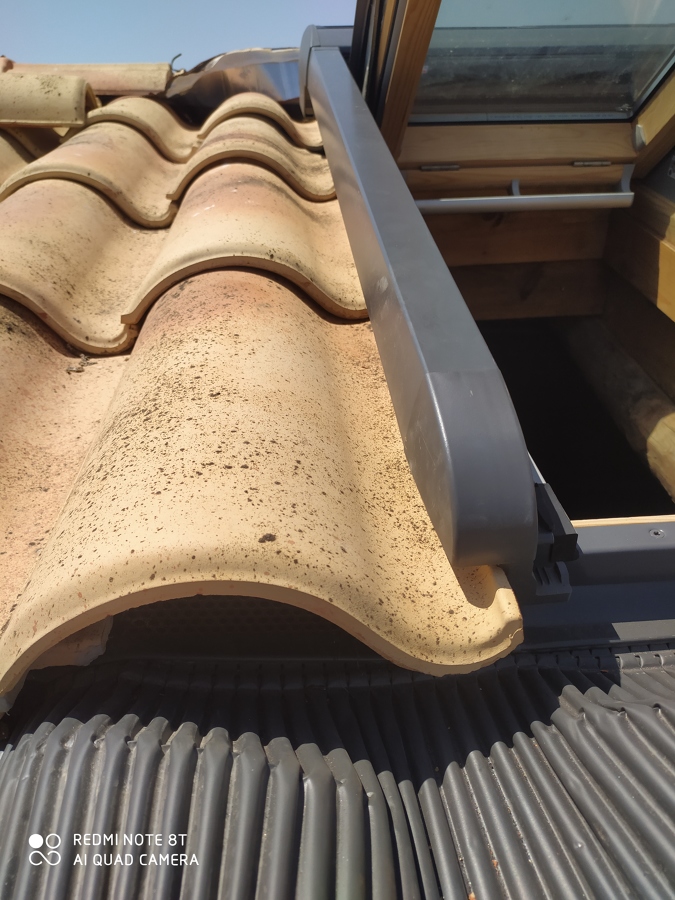 Detalle velux en cubierta ventilada