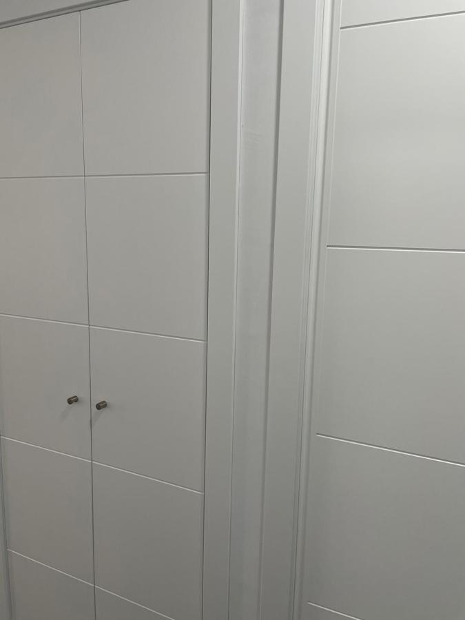 Armario a medida puertas abatibles