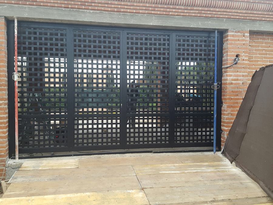 Puerta cancela de Comunidad