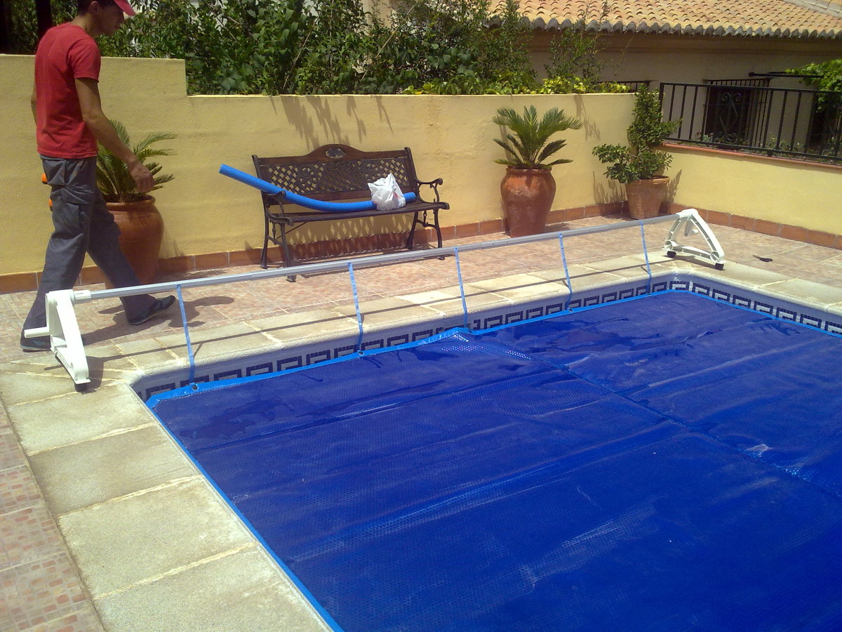 manta de termica de verano y enrollador telescopico.