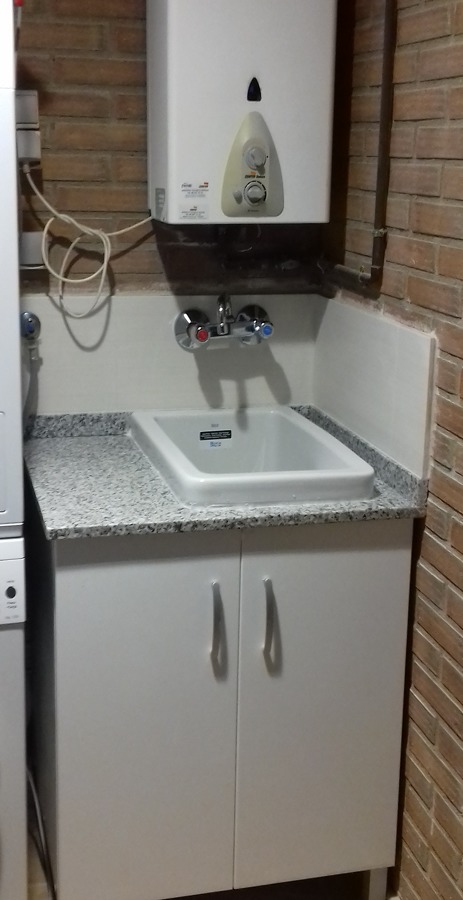 Colocación pila de lavadero