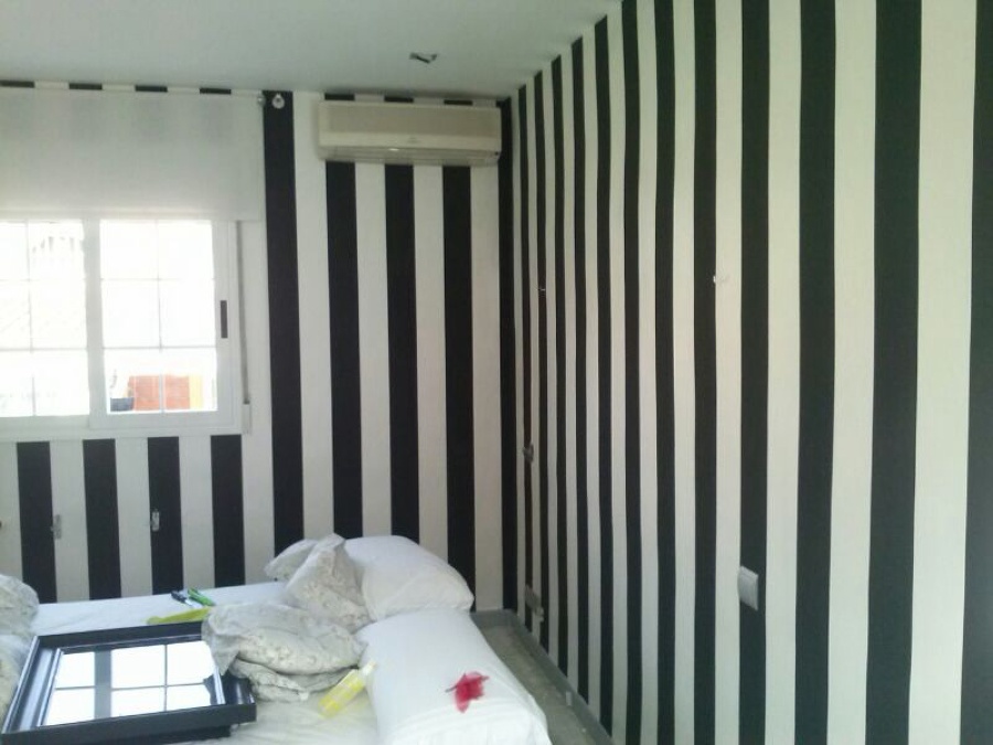 Papel vinilico.
