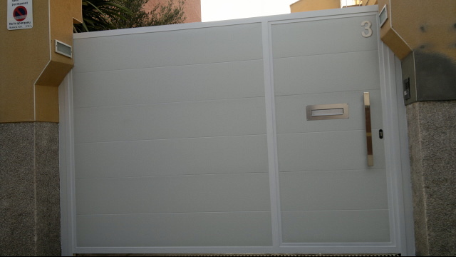 Puertas parking + peatonal