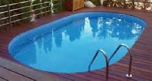 reformas de vaso y revestir con " liner" + terazza de mmadera