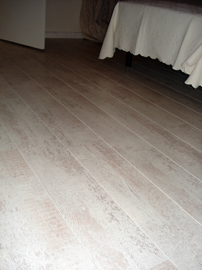 SUELO LAMINADO DORMITORIO