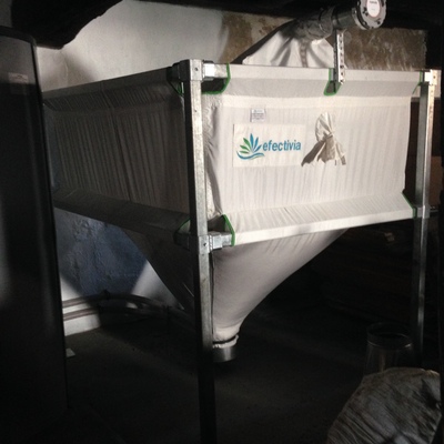 Instalación de caldera mixta (leña+pellets), con silo textil para pellets y producción de ACS para vivienda particular en Navarra