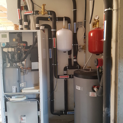 Instalacion bomba de calor(aerotermia) Daikin 11,4kw+deposito de inercia 100l