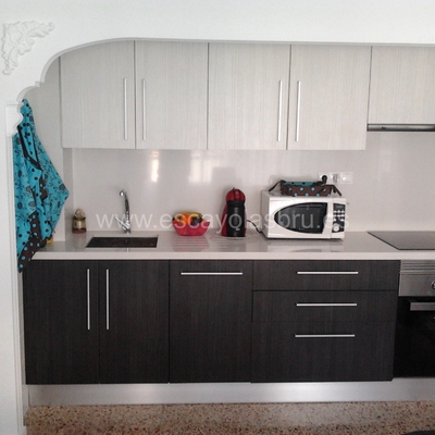 quitar tabique y puertas en cocina y posterior instalación de arco de escayola a medida