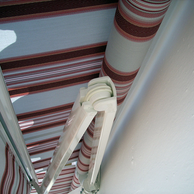 brazos de toldo articulado