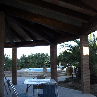 Construcción cubierta circular adosada a vivienda