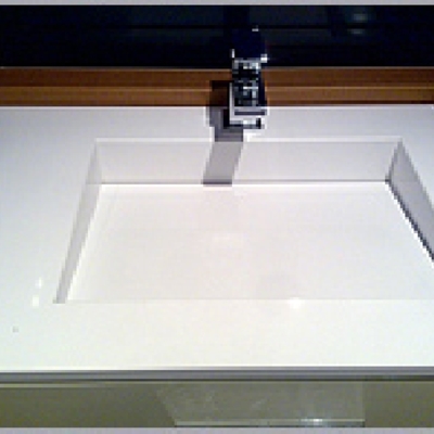 encimera de bany amb silestone blanc i pica integrada