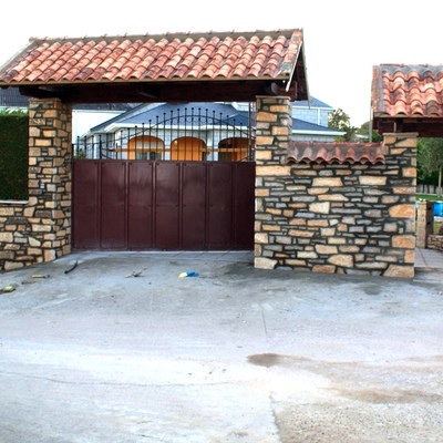 Entrada a parcela.