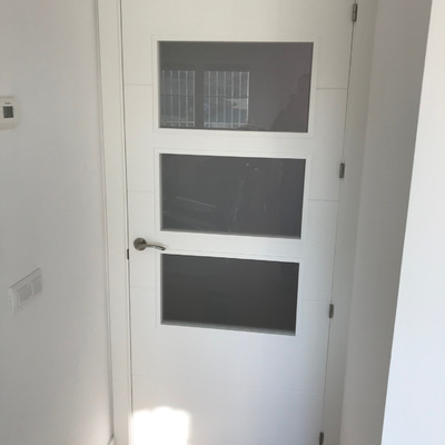 Cambio de puertas e instalación de suelo laminado Pergo