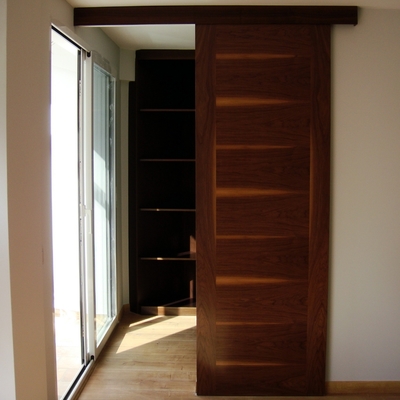Puerta corredera de galería