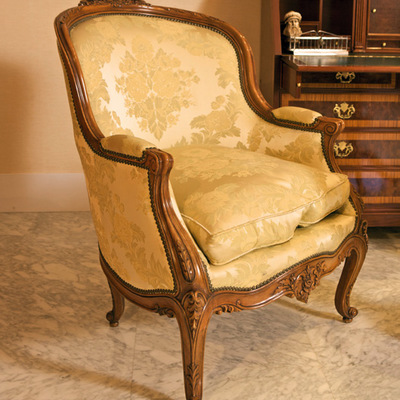 Sillón clásico tapizado