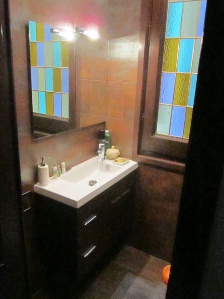 baño porcelanato oxido